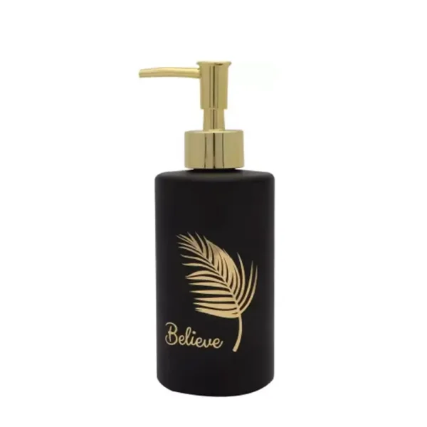 Black color glass soap dispenser with matt finish and golden pump on white background