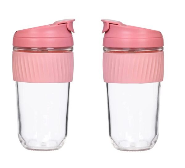 two pieces of glass coffee mug pink color on white background