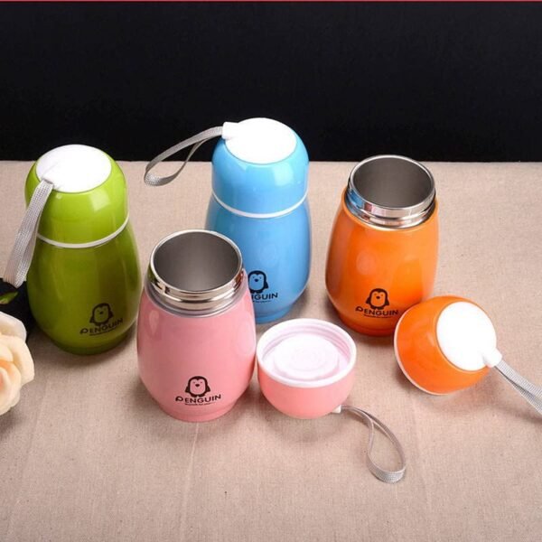 Assorted colours penguin water bottle for kids on table