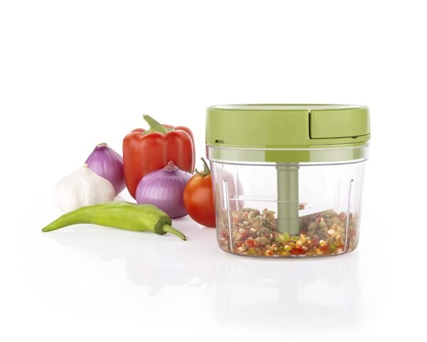 vegetable chopper cum beater on white background with vegetables