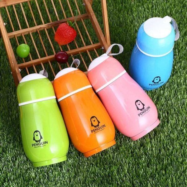 Assorted colours double wall penguin shape water bottle on grass