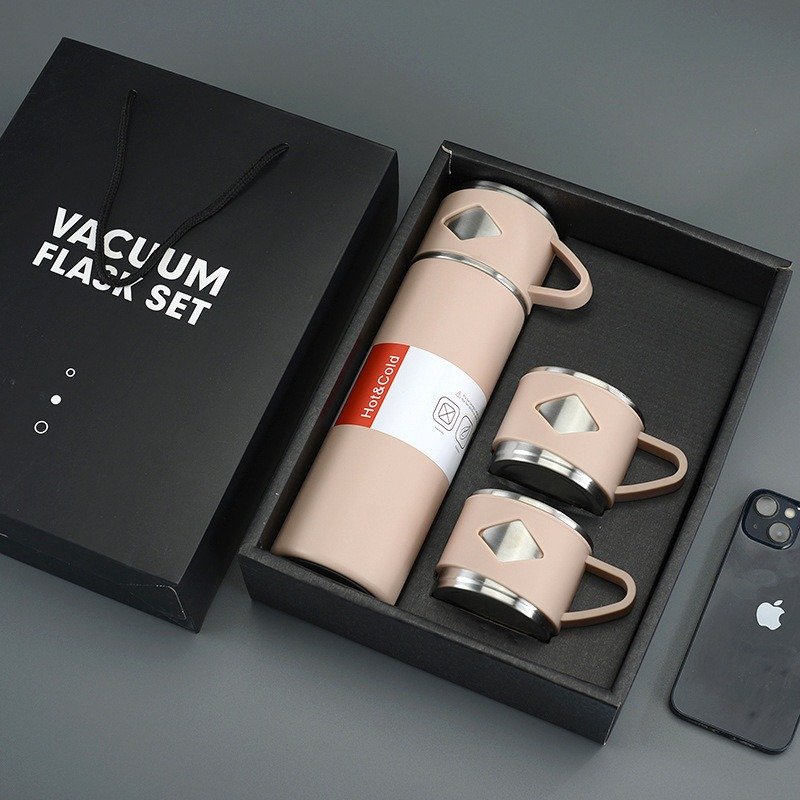 pink color vacuum flask gift set with box packing on table