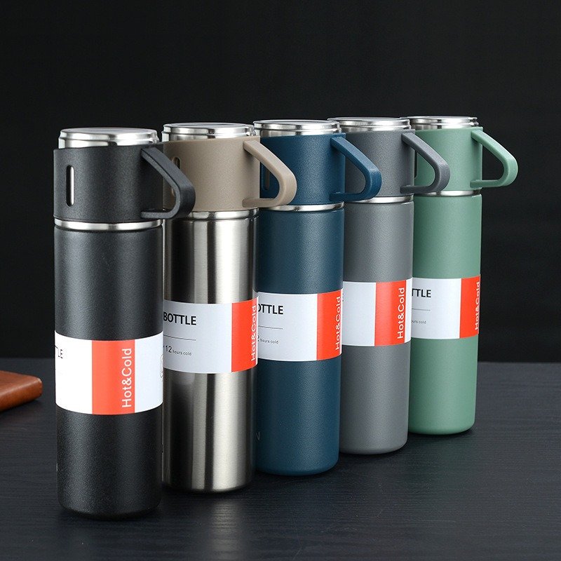 assorted color vacuum flask gift set on table in a row