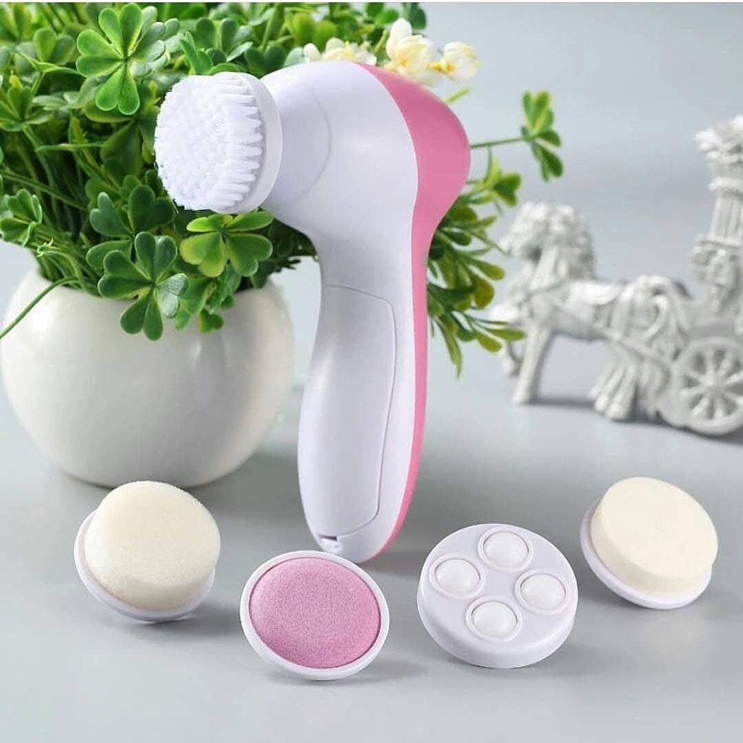 portable face and body massager on decorative background