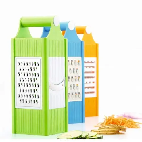 Assorted colors slicer grater on white background