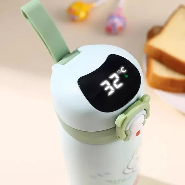 LED temperature display of kids temperature sipper on decorative background