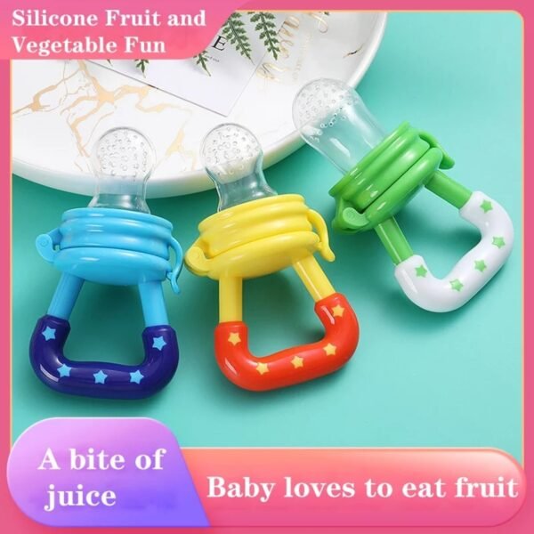 3 pcs mix color silicone baby teether and fruit feeder on table