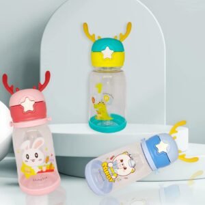 Three pieces of different color kids sipper bottle on decorative background