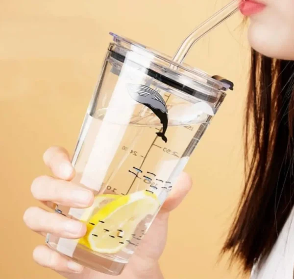 Girl drinking water from printed mason jar
