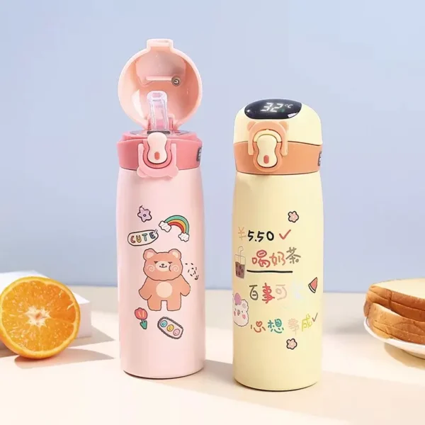 Two pieces of kids temperature sipper on table having different color and prints