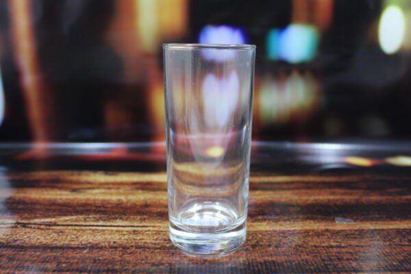 Premium plain water glass on decorative bakcround