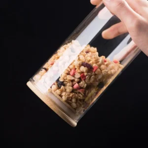 Airtight lid of glass food container in hand