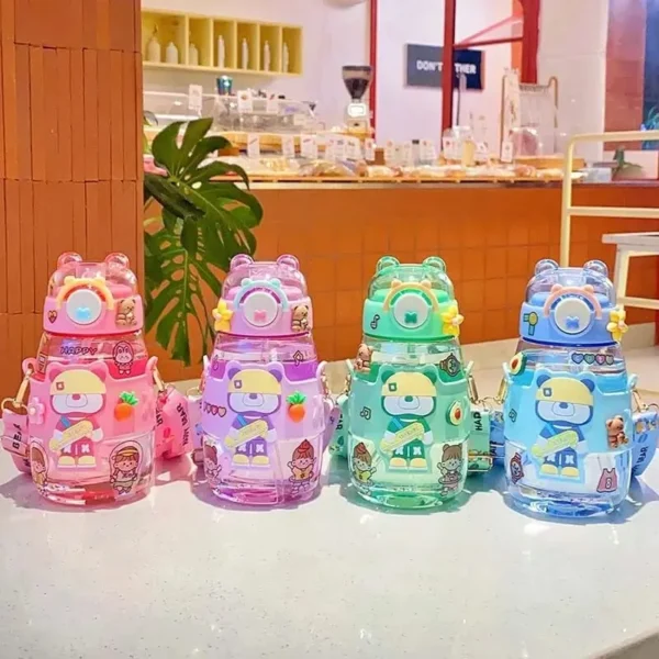 Transparent plastic kids sipper with silicone character sleeve