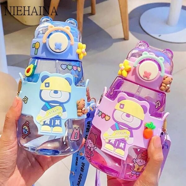 Blue and purple color plastic sipper for kids on decorative background