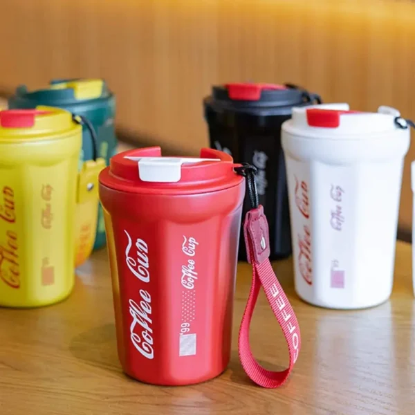 Assorted color thermal insulated vacuum coffee cup on table