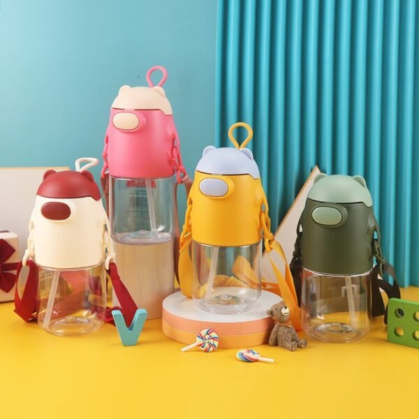 Assorted color plastic sipper on decorative background