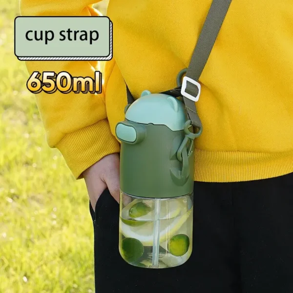 Plastic sipper with strap hanging on shoulder having 650 Ml capacity