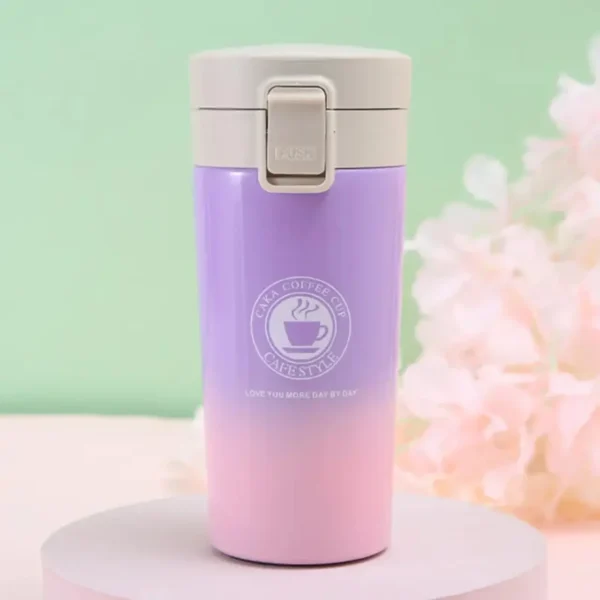 Pinkish color dual shade double wall coffee mug on decorative background