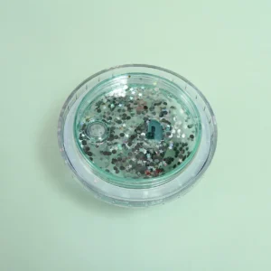 Showing leak proof glitter lid of acrylic sipper on colorful background