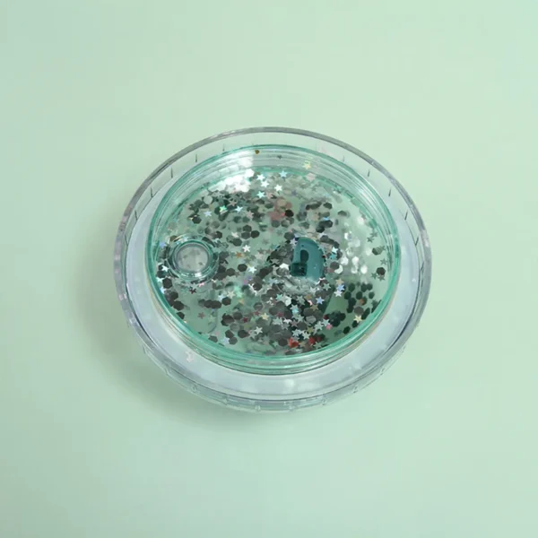 Showing leak proof glitter lid of acrylic sipper on colorful background