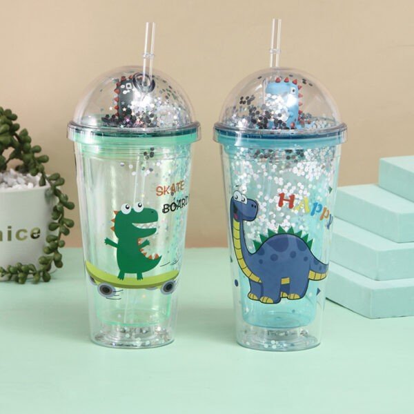 2 pcs of glitter acrylic dino print sipper with straw on colorful background