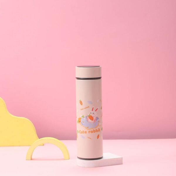 Double wall insulated flask on decorative background