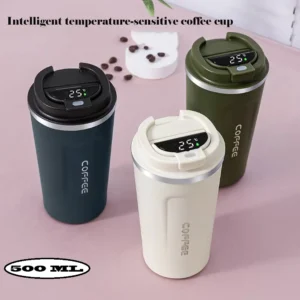 Different color coffee mug with temperature display on decorative background