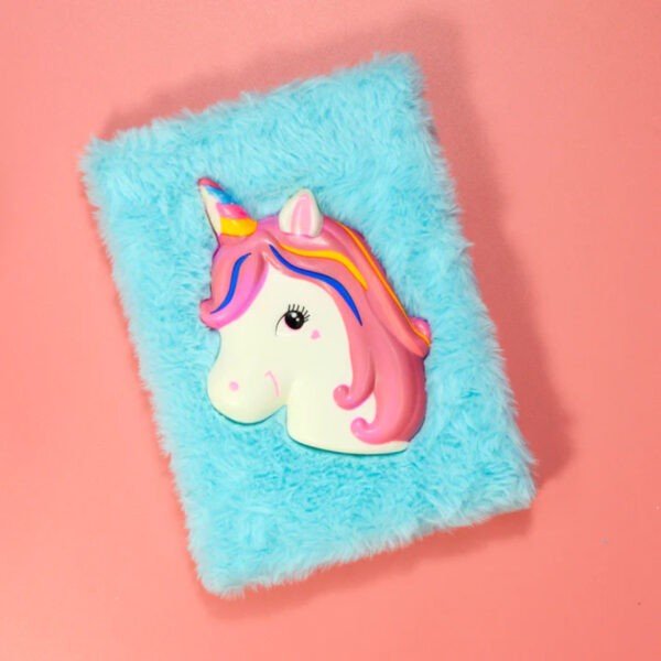 Blue color embossed unicorn sticker diary on pink background
