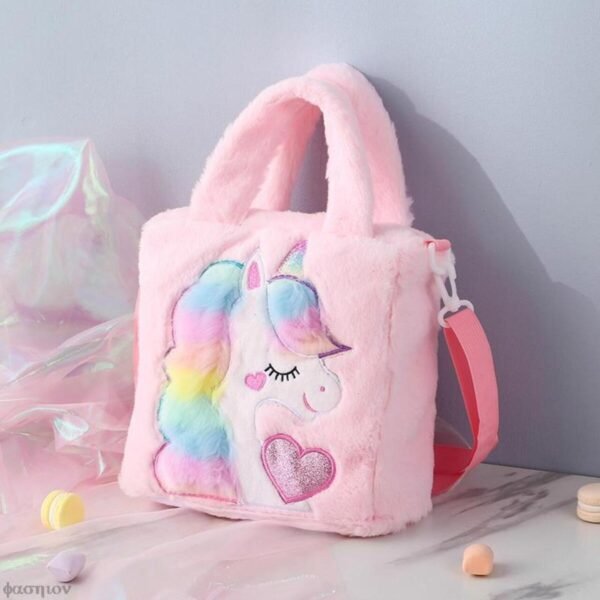 unicorn sling bag with handle pink color on decorative background