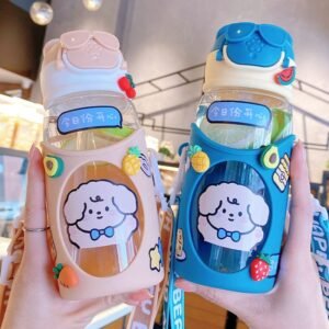 Kids plastic sipper with plastic sleeves and sticker in hand on decorative background