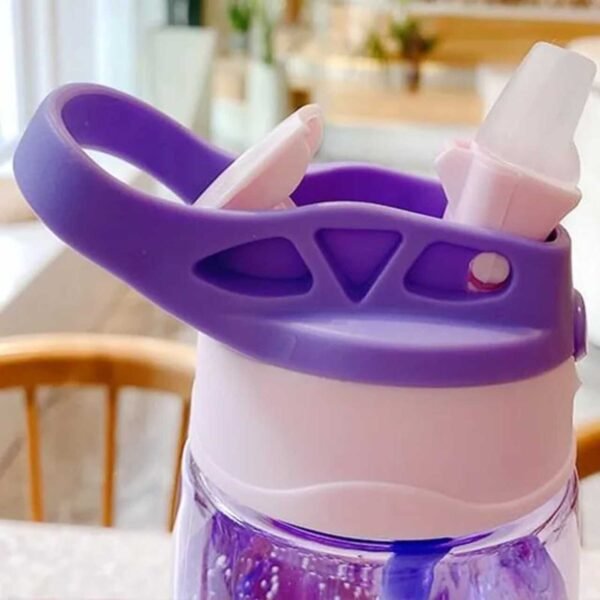 Showing sipping straw of purple color 480 ml kids plastic sipper on decorative background