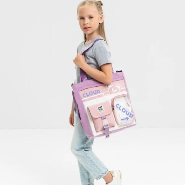 Purple color tote bag on girls shoulder on white background