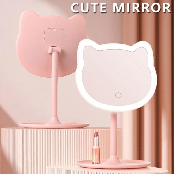 Makeup Mirror pink color on decorative background