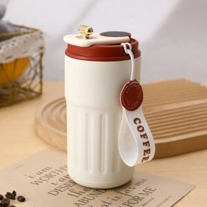 Stainless Steel Thermos Cup white color on table