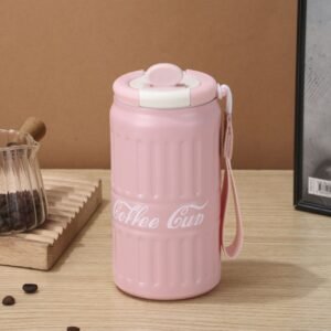 Thermos Coffee Cup pink color on decorative background