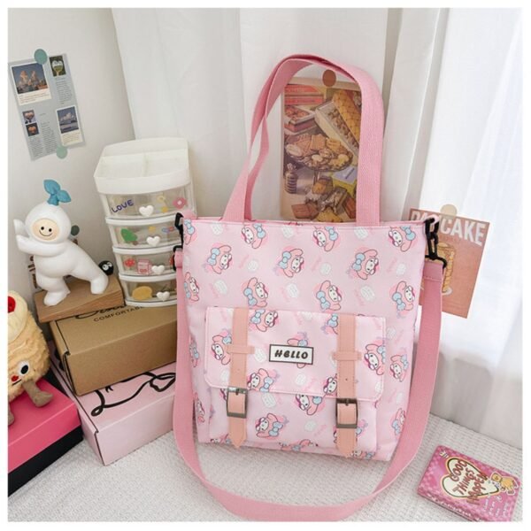 Cinnamon Printed pink color tote bag with adjustable strap on decorative background