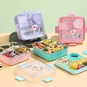 Bento Lunch Box mix colors with 3 compartment with printed lid filled with food on decorative background