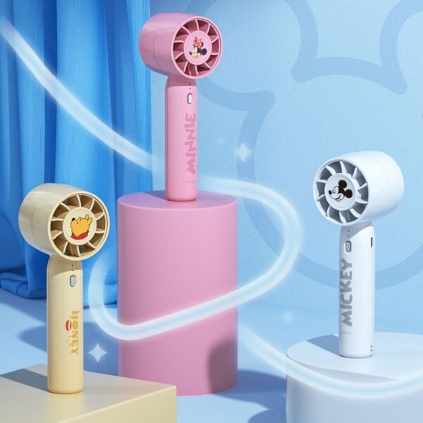 Three character themed handheld fans: a pink Minnie on a pink stand, a yellow Pooh fan on a beige stand, and a white Mickey fan on a white stand, with a blue background