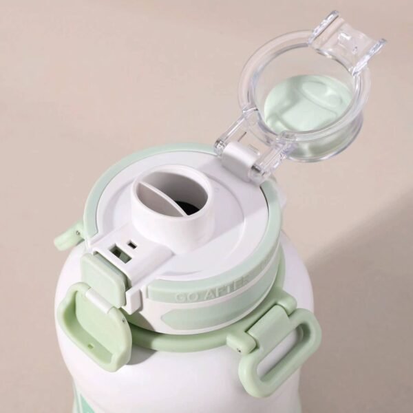 Close-up top view of the open lid of an vacuum flask in 'Hijau'(green), showing the integrated straw or sip spout and secure lock mechanism, with 'GO AFTER' visible on the base.