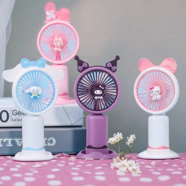 A set of four portable fans inspired by Sanrio characters, including My Melody, Cinnamoroll, Kuromi and Hello Kitty. Each fan is decorated with character details, such as bunny ears, do ears and bows, set on a cute pink and gray background with polka dots and flowers