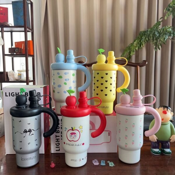 Kawaii Printed Insulated Tumbler Different colors on table with decorative background