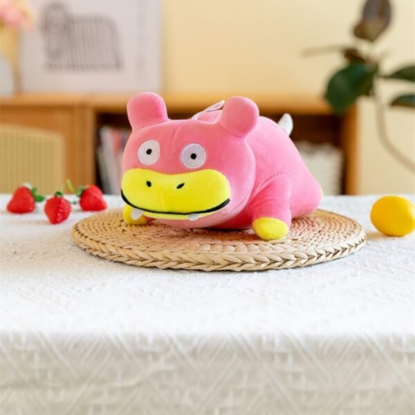 Slowpoke Pokémon Plush Toy Pink & Yellow colors with decorative background