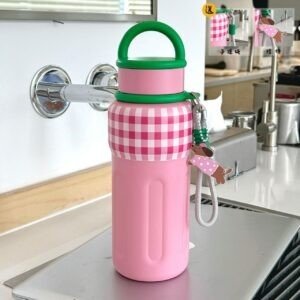 Stainless Steel Check Bottle Pink Color with decorative background