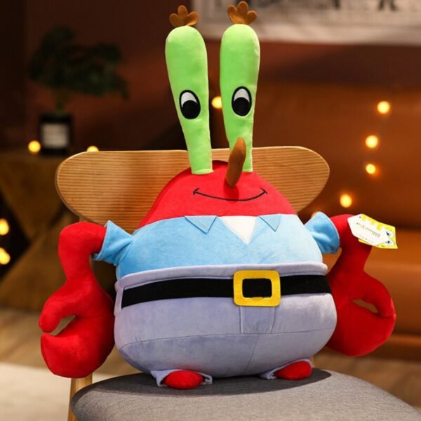 SquarePants Krab Plush Toy sitting on chair with decorative background