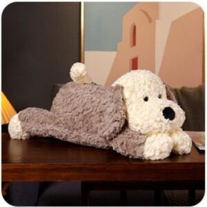 Large, lying-down plush dog toy with a cream-colored head and brown body, featuring shaggy, ultra -soft fabric; ideal for wholesale comfort toy inventory.