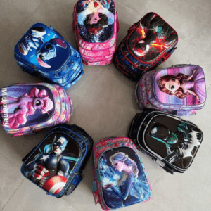 15" 3D School bag for kids. Assorted designs and colors on the floor