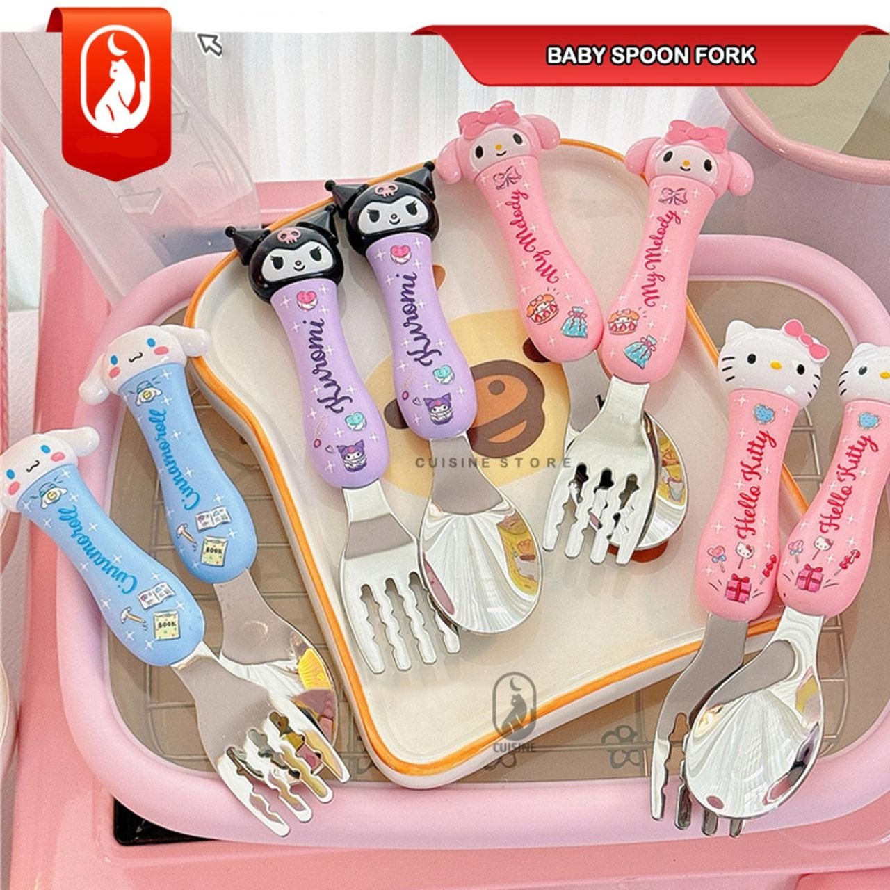 Sanrio themed baby spoon and fork set featuring Hello Kitty, My Melody, Kuromi and Cinnamoroll characters with soft grip handles.