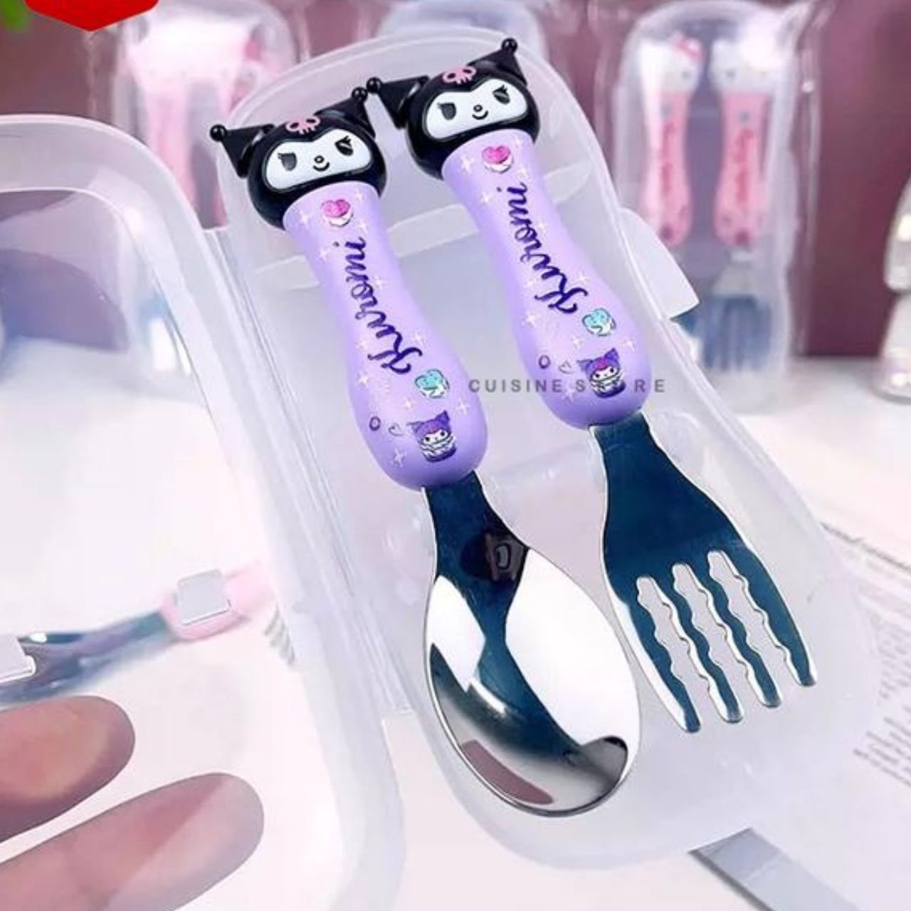 Blue Cinnamoroll themed baby spoon and fork set with white soft-grip handles and stainless steel tips in a clear case.