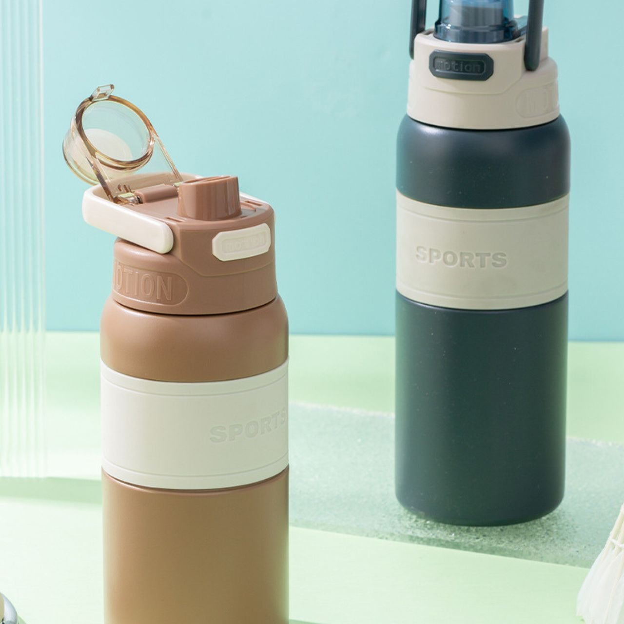 Stainless Steel Insulated Bottle with Handle | Portable & Leakproof | Silicone Sleeve | Push Lock Button | 600 ML | Assorted Colors | Box Packing - Image 3